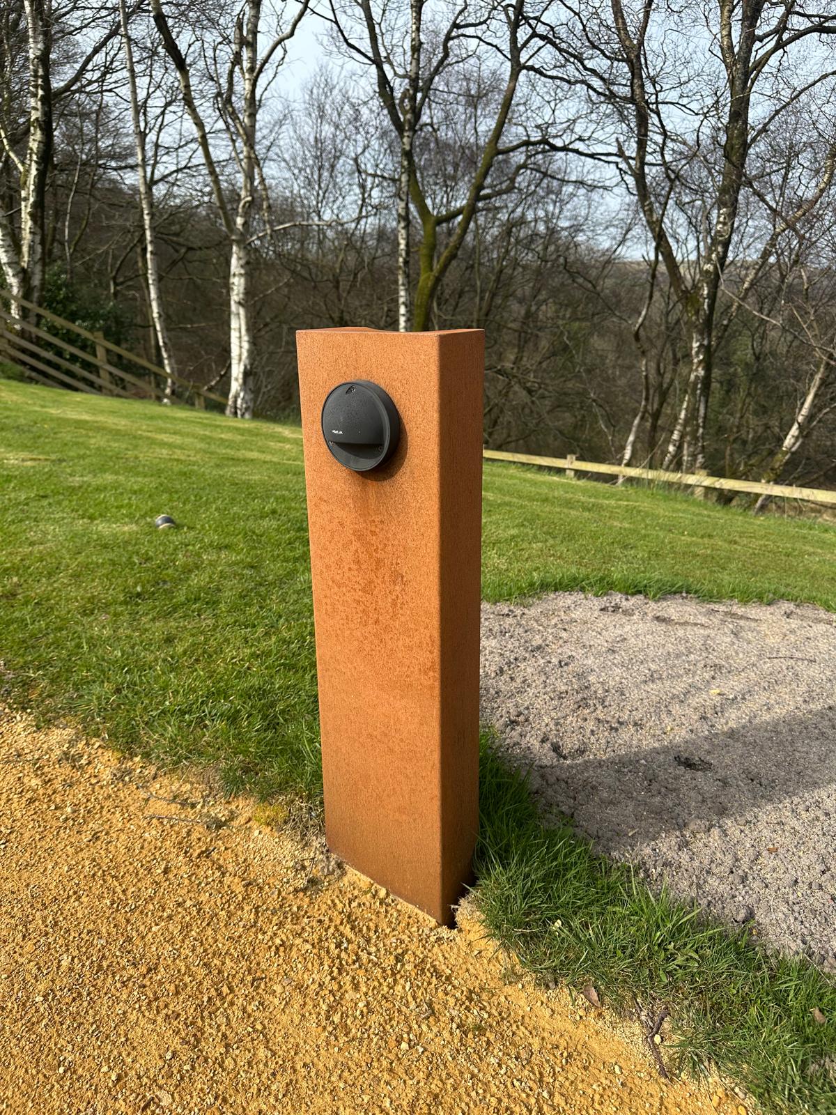 Cor-Ten Steel power hookup, metal garden art and decorative fabrication