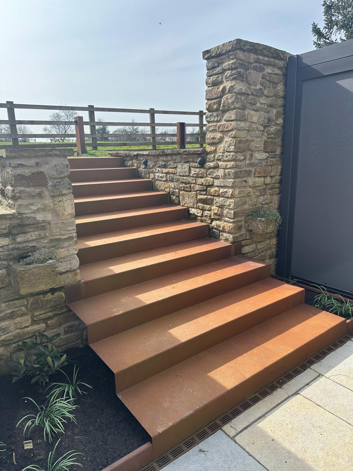 Cor-Ten Steel steps, metal garden art and decorative fabrication