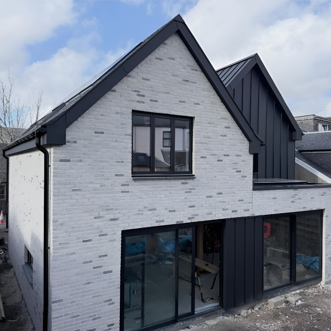 Standing Seam Roofing and Cladding Residential House in GreenCoat PLX Nordic Night Black